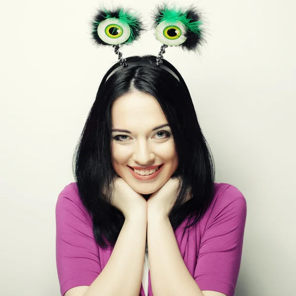 Surprised woman with funny green eyes. — Stock Photo, Image