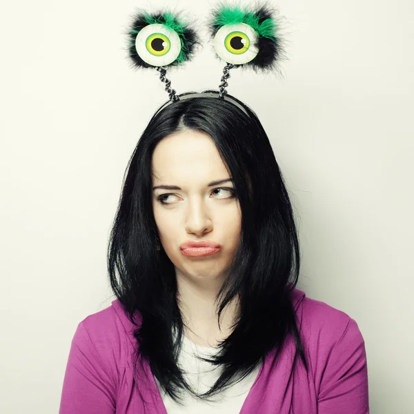 Surprised woman with funny green eyes. — Stock Photo, Image