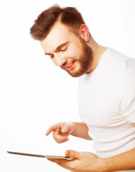 Young man  using a tablet computer — Stock Photo, Image