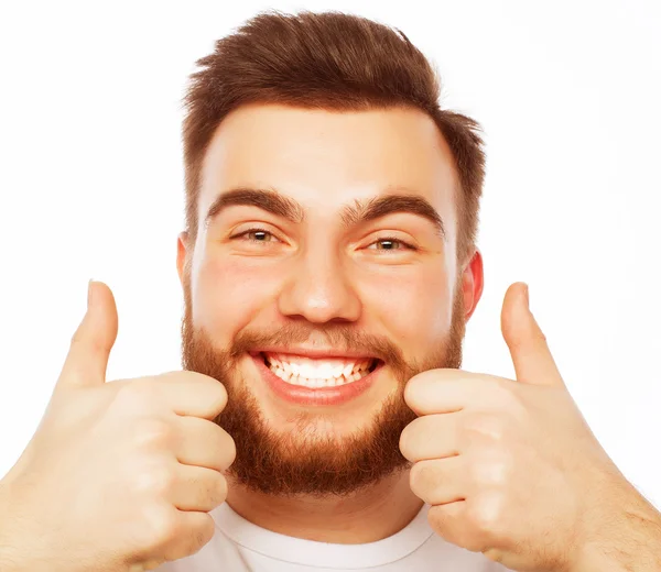 Happy man giving thumbs up sign — Stock Photo, Image