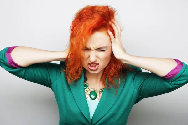 Woman with a headache holding head — Stock Photo, Image