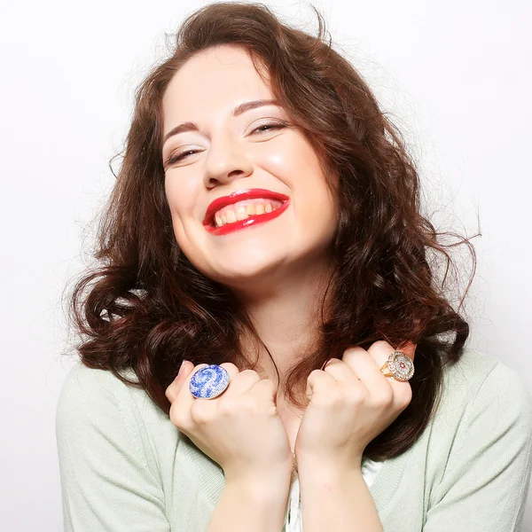 Beautiful young surprised curly woman. — Stock Photo, Image