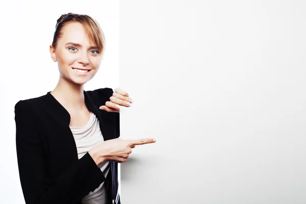 Young business woman showing blank signboard — Stock Photo, Image