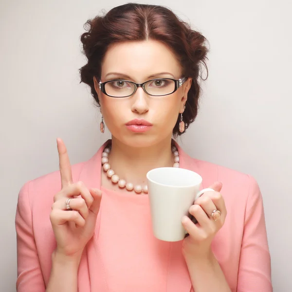 Young businesswoman having a coffee-break — Stock Photo, Image