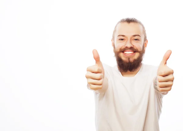 Happy man giving thumbs up sign — Stock Photo, Image