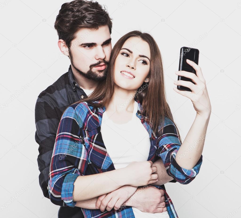 loving couple making selfie