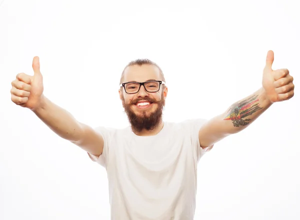 Happy man giving thumbs up sign — Stock Photo, Image