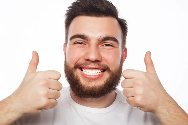 Happy man giving thumbs up sign — Stock Photo, Image