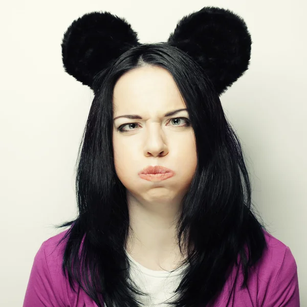 Surprised young woman with mouse ears — Stock Photo, Image