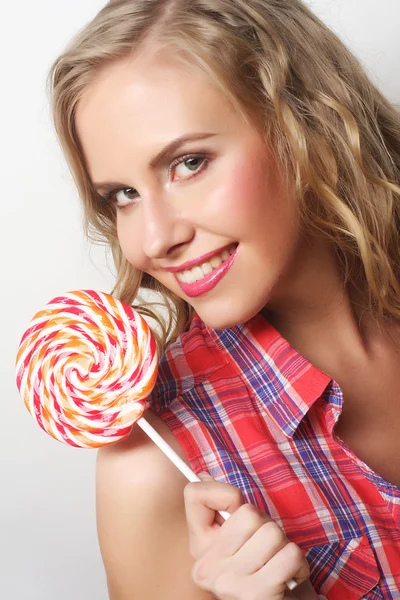 Giovane ragazza con lolipop — Foto Stock