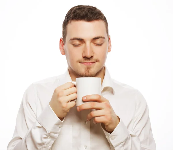 Hombre sosteniendo taza blanca con café —  Fotos de Stock