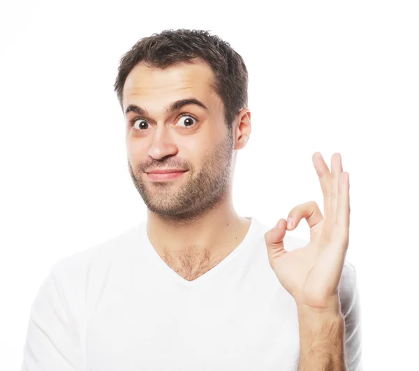 Happy handsome man showing thumbs up — Stock Photo, Image