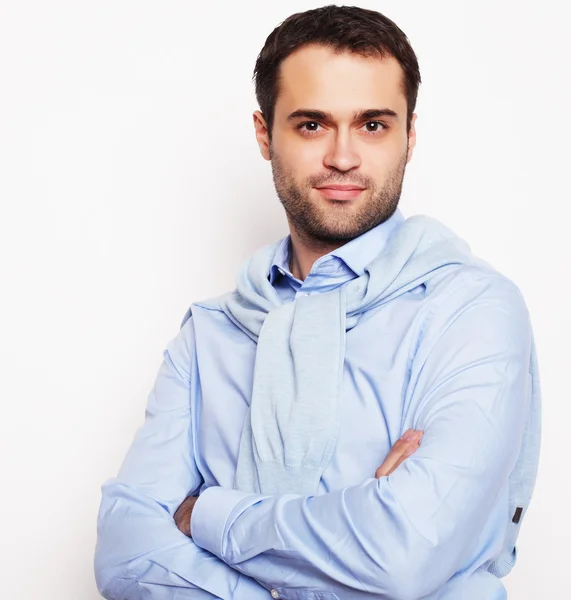 Happy young man in blue shirt. — Stock Photo, Image