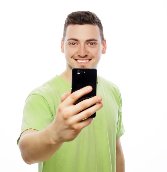 Young man making photo of himself — Stock Photo, Image