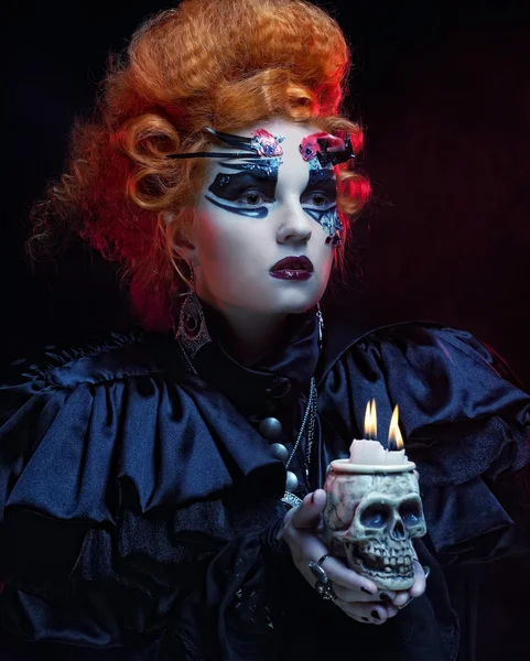 Fantasy woman with skull. Halloween theme. — Stock Photo, Image
