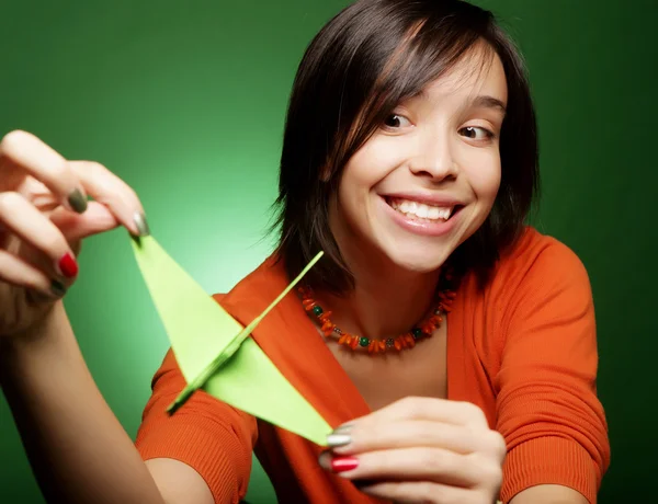 Young expression woman with paper bird — Stock Photo, Image