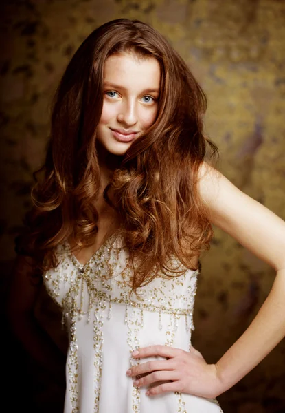 Young woman with long curly hair — Stock Photo, Image