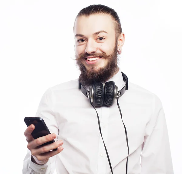 Junger bärtiger Mann mit Handy — Stockfoto