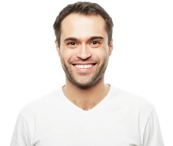 Hombre guapo en camisa blanca en blanco — Foto de Stock