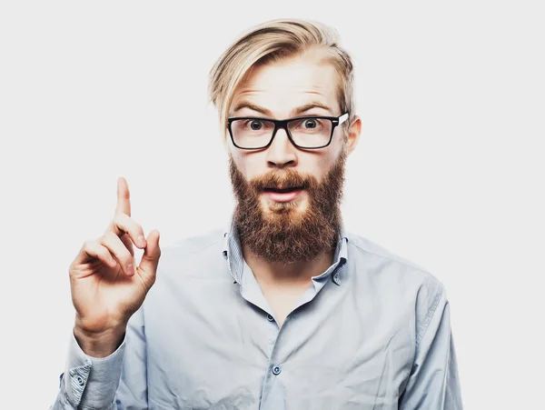 Young bearded man with good idea sign. — Stock Photo, Image