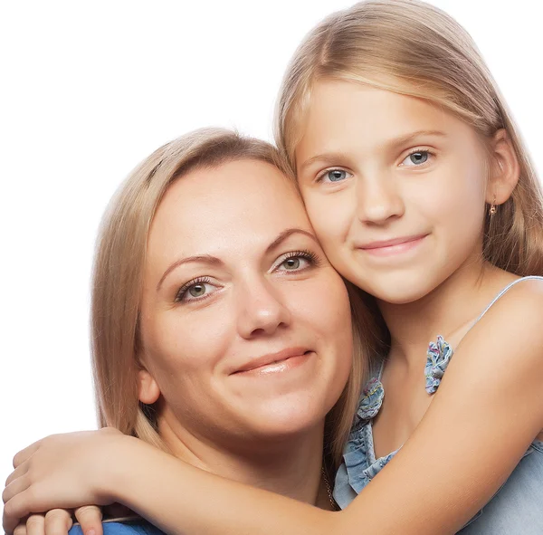 Mãe e sua filha sorrindo para o veio — Fotografia de Stock