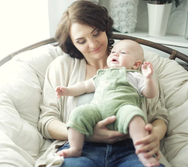 Happy young mother with baby — Stock Photo, Image