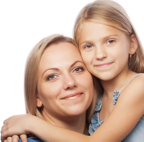 Mother and her daughter smiling at the came Stock Image