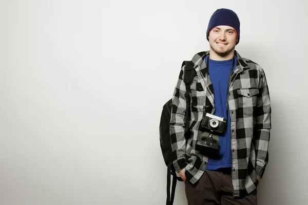 Young  photographer over white background — Stock Photo, Image