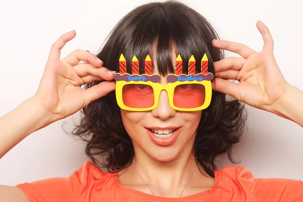 Young happy woman with big orange sunglasses — Stock Photo, Image