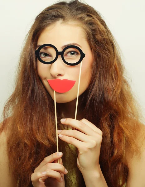 Speelse jonge vrouw klaar voor feest — Stockfoto