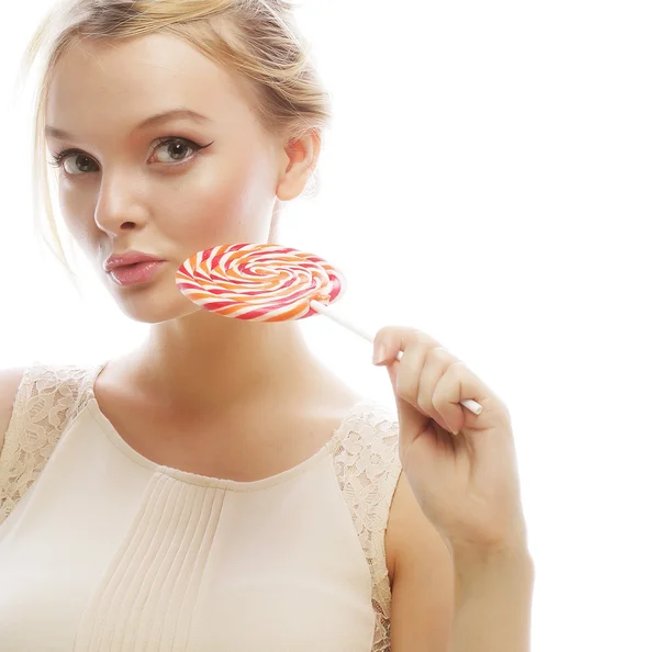 Fashion blond woman  holding lollipop — Stock Photo, Image