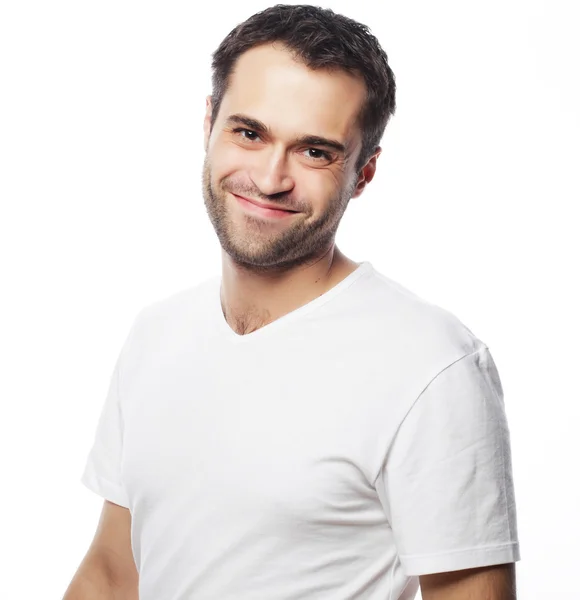 Hombre guapo en camisa blanca en blanco — Foto de Stock