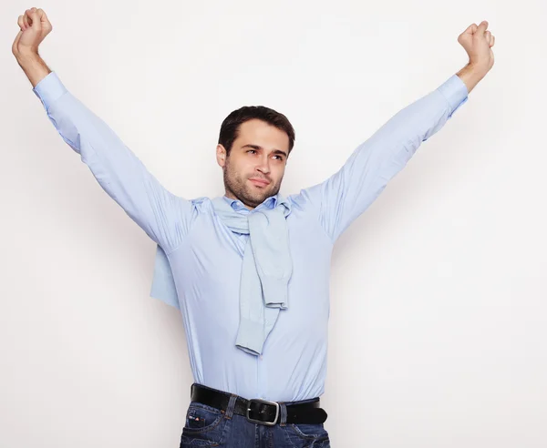 Happy young man in blue shirt. — Stock Photo, Image