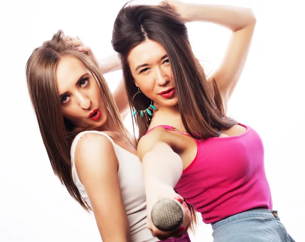 Sensual girls singing with microphone — Stock Photo, Image