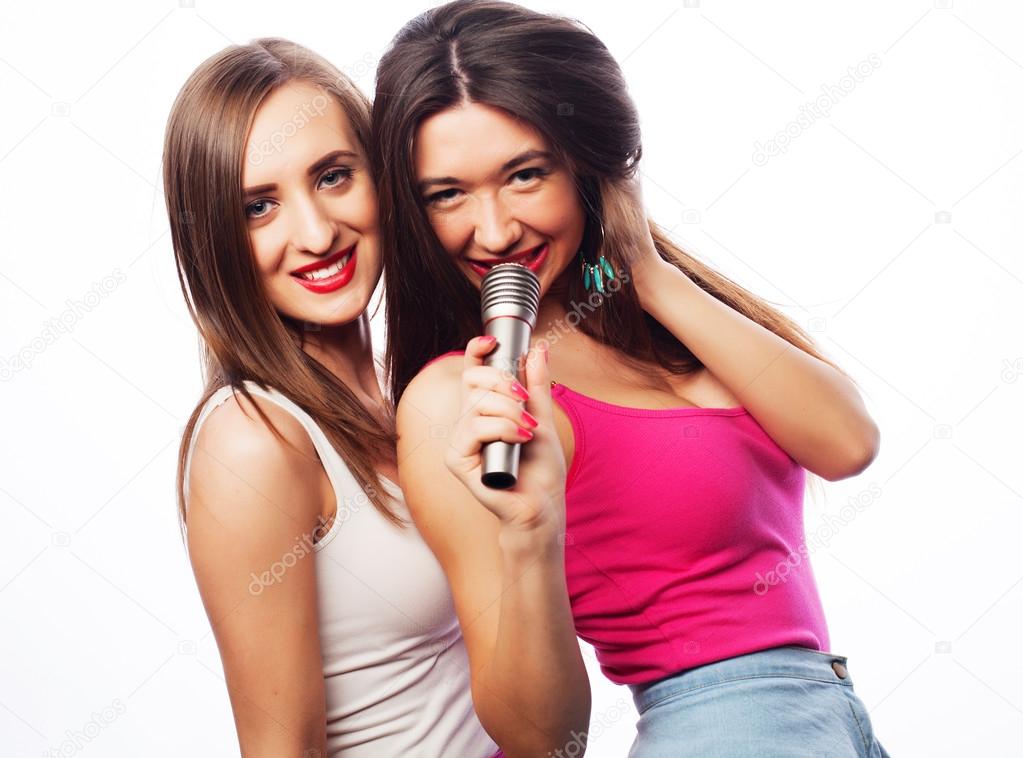 sensual girls singing with microphone