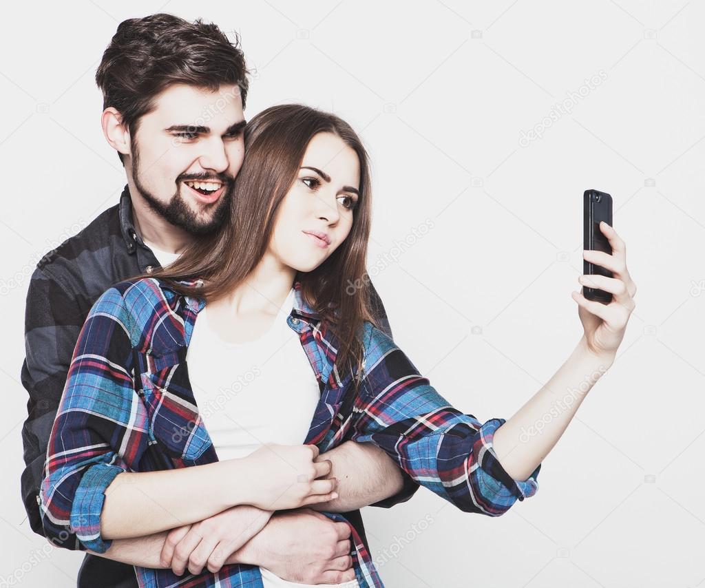 loving couple making selfie 
