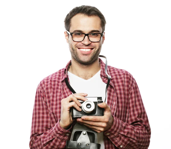Mladý muž s retro fotoaparát — Stock fotografie