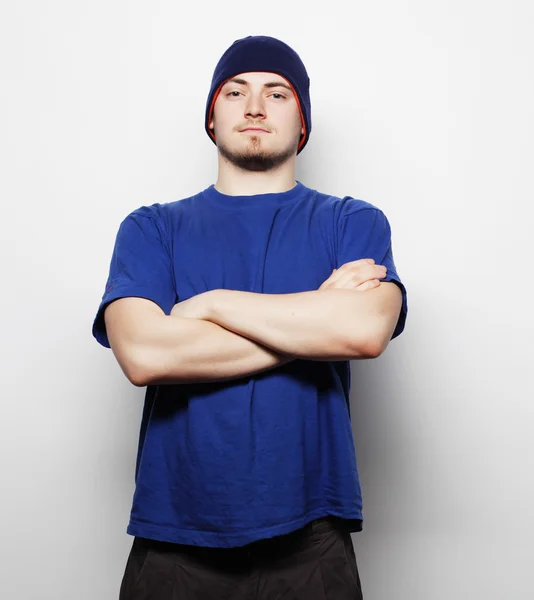 Man in blue t-shirt and blue hat. — Stock Photo, Image