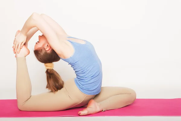 Blond woman working yoga exercise — Stock Photo, Image