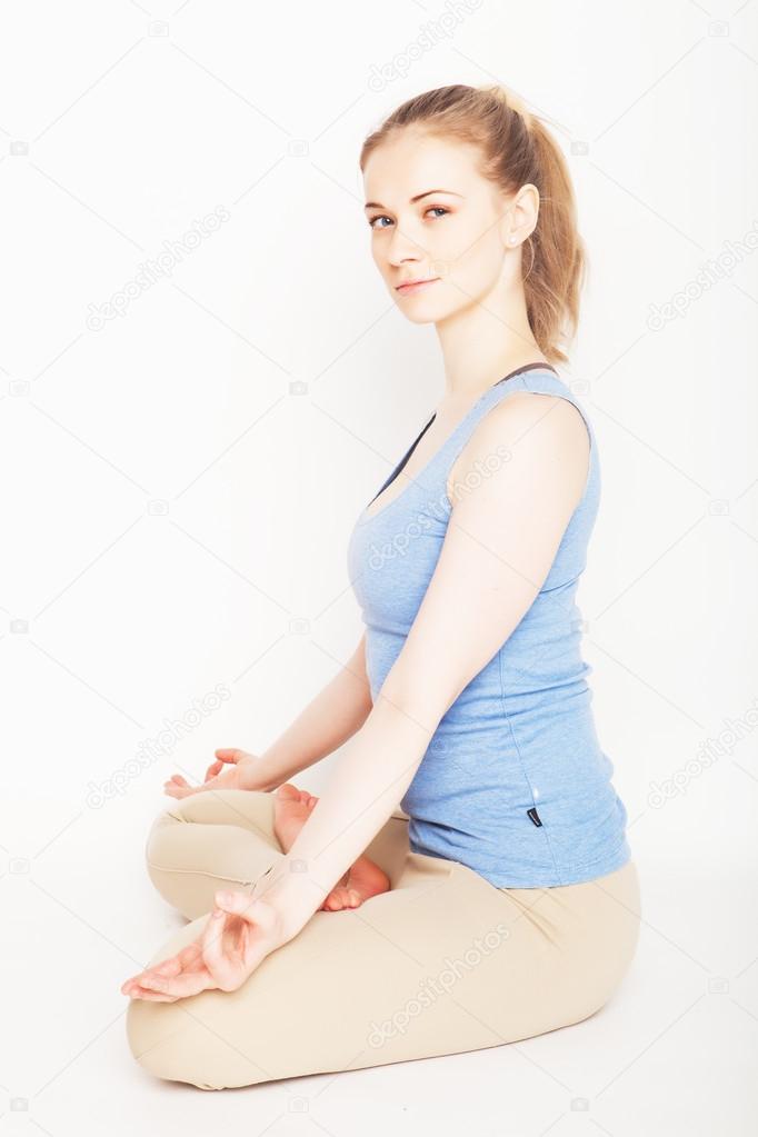 blond woman working yoga exercise