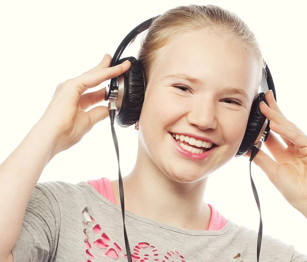 Beautiful happy little girl with headphones — Stock Photo, Image