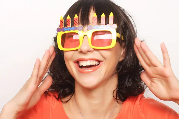 Young happy woman with big orange sunglasses — Stock Photo, Image