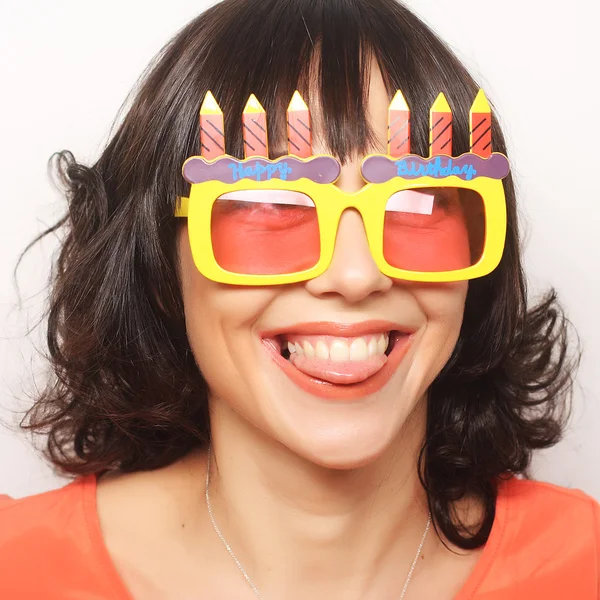 Young happy woman with big orange sunglasses — Stock Photo, Image