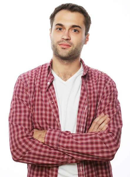 Schöner junger Mann im Hemd schaut in die Kamera — Stockfoto