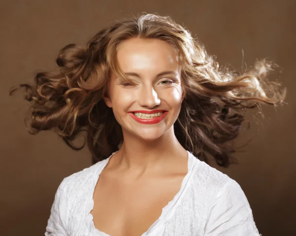 Beautiful woman  with gorgeous curly hair — Stock Photo, Image