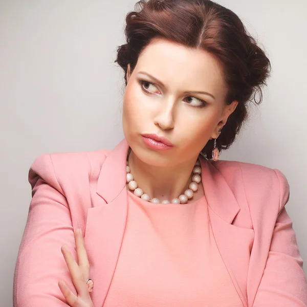 Young businesswoman in pink — Stock Photo, Image