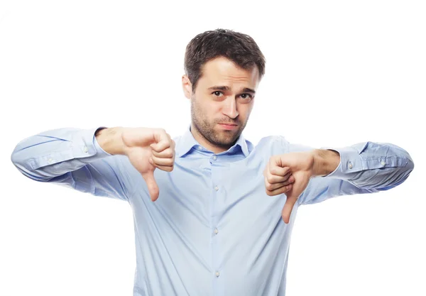 Hombre de negocios joven decepcionado con el pulgar hacia abajo . — Foto de Stock