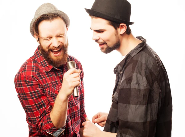 Young mens singing with microphone — Stock Photo, Image