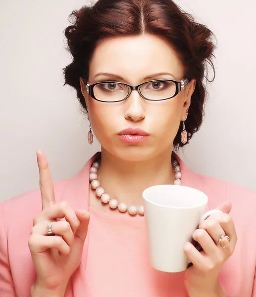 Business woman having a coffee-break — стоковое фото