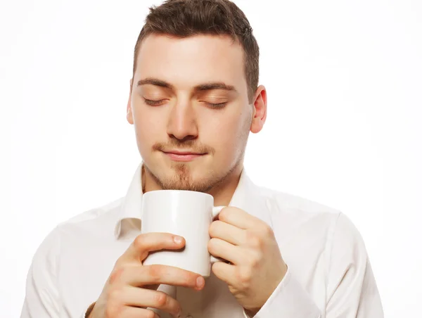 Hombre sosteniendo taza blanca con café —  Fotos de Stock